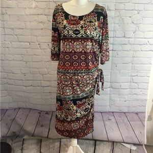 Olivia Matthew’s faux wrap midi dress Plus 3X